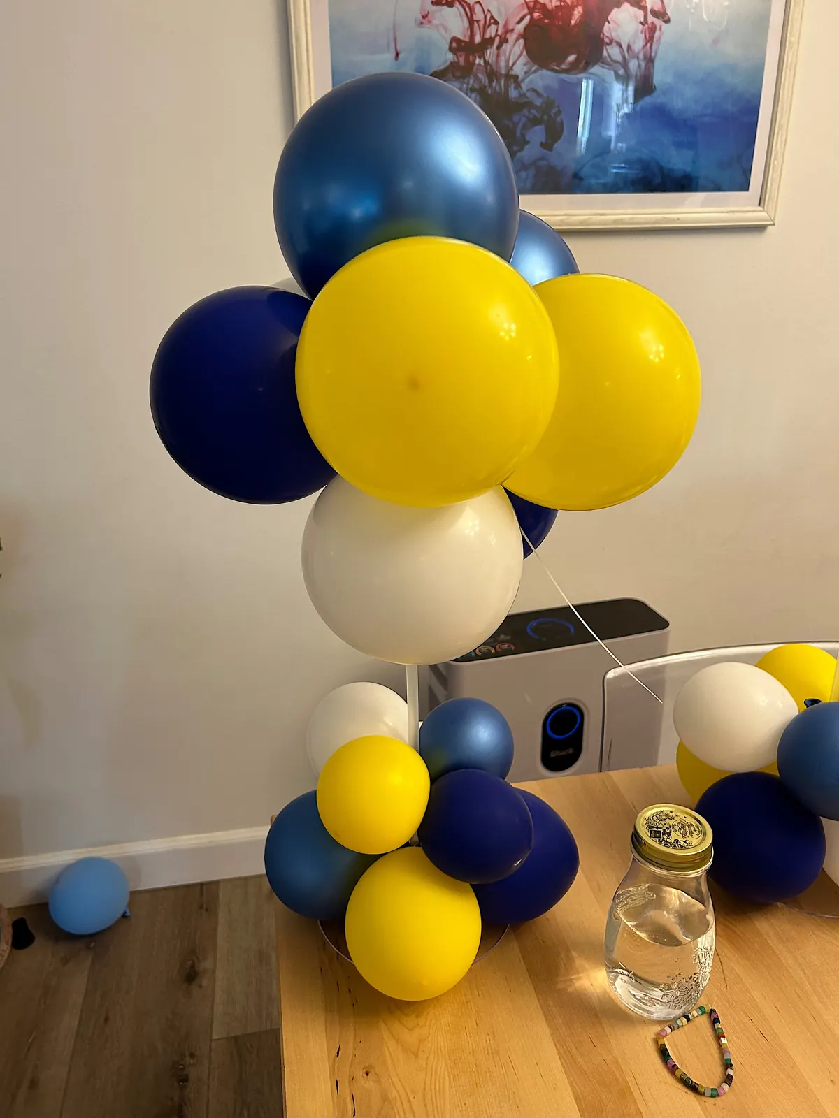 Navy, yellow and white balloon centerpiece